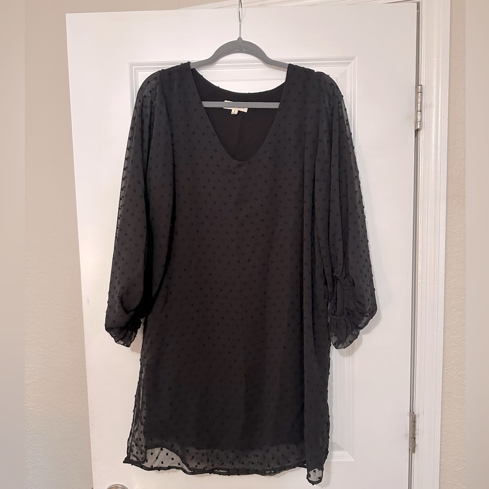 Black three-quarter sleeve shift dress